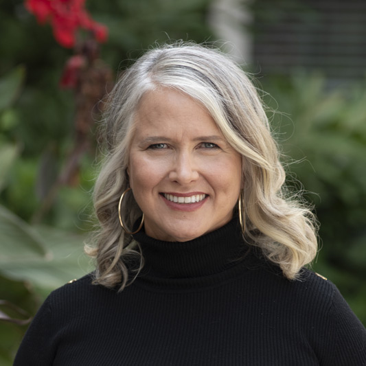 Taylor Campbell, one of our elopement photographers pictured in Forsyth Park.